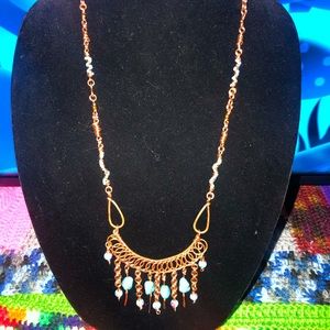 Stunning turquoise and copper necklace.